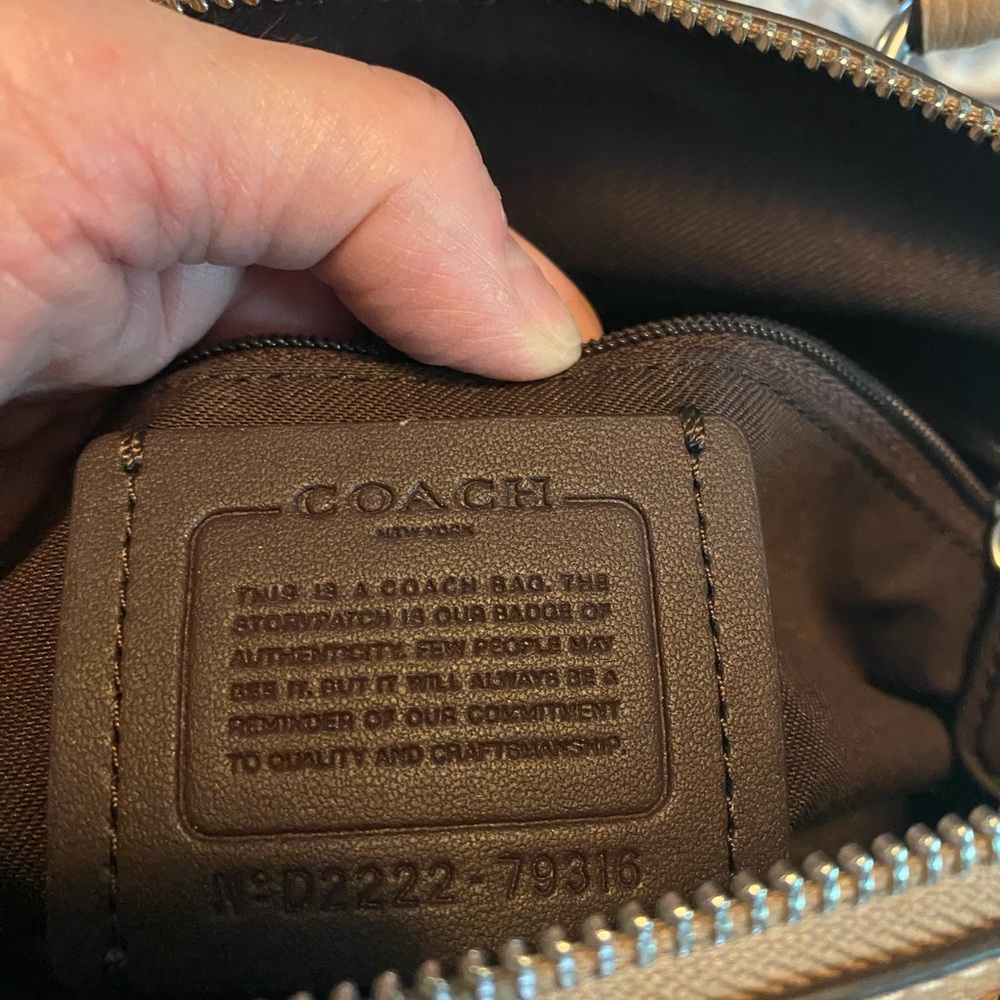 Coach Brown Leather Wallet with Classic Embossed Design